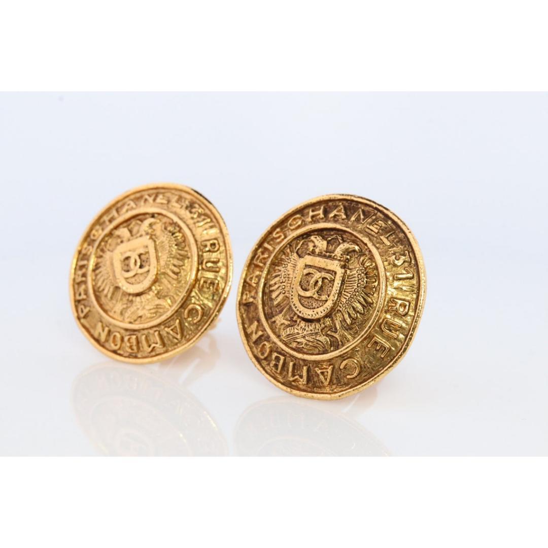 Women's Chanel Earrings. Genuine CC CHANEL Round Crest Shield LOGO Clip on earrings. For Sale