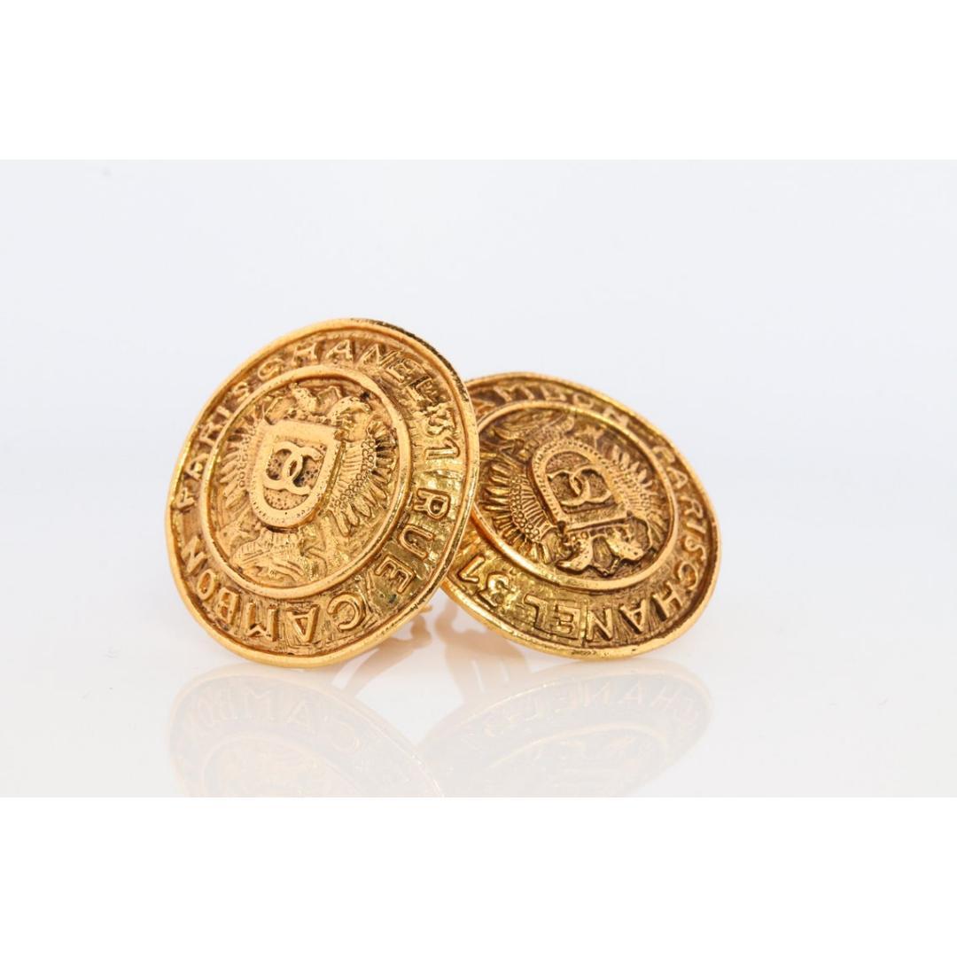 Chanel Earrings. Genuine CC CHANEL Round Crest Shield LOGO Clip on earrings. For Sale 1