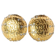 Pendientes Chanel. Genuino CC CHANEL LOGO Redondo Pendientes de clip Disco de cristal