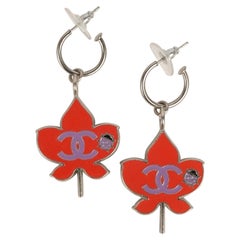 Chanel Earrings in Silver Plated Metal Enamelled