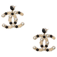 Chanel Earrings topped with faux pearls, rhinestones and resin, SHW