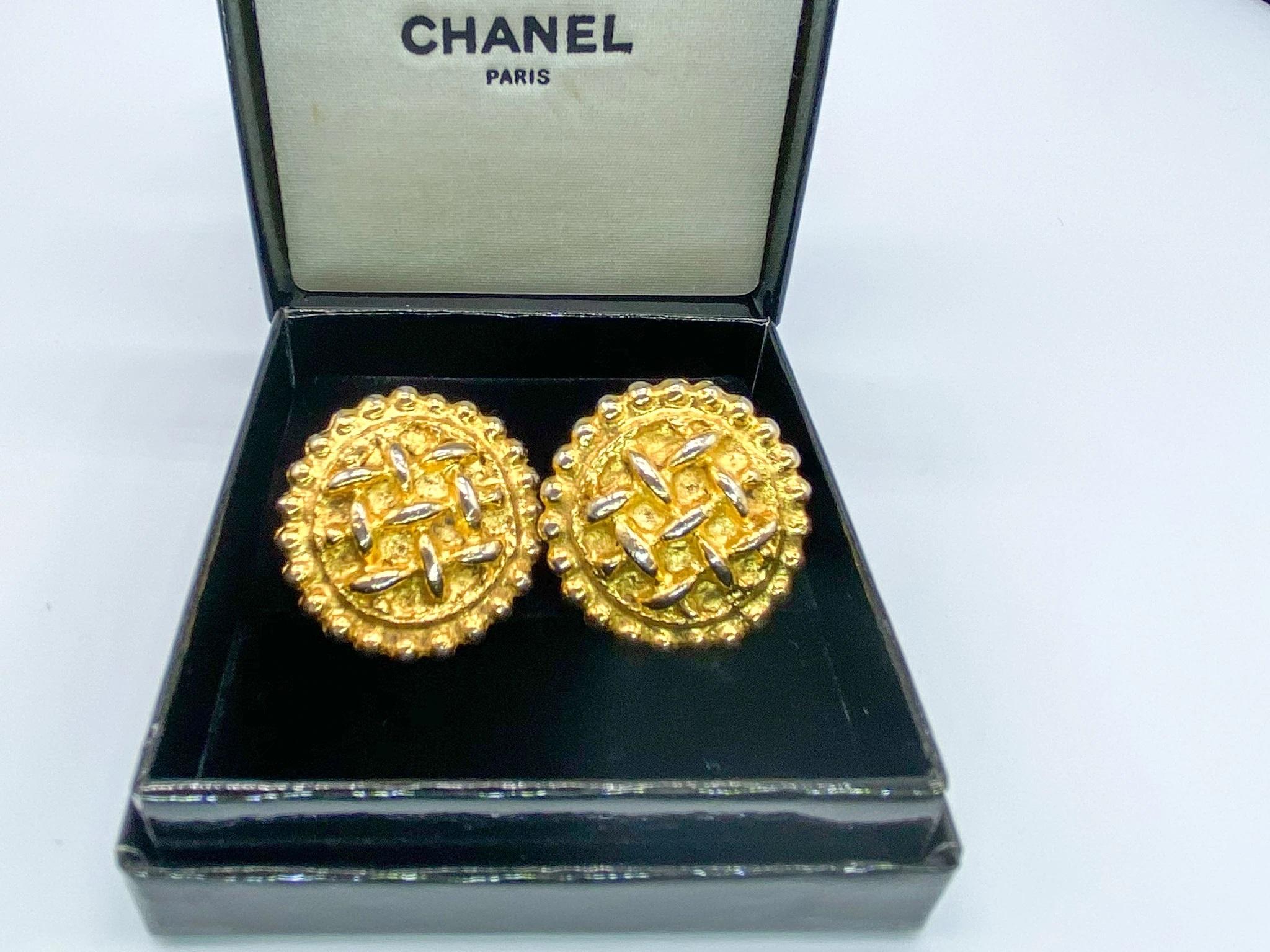 Chanel 1980s Vintage Gold Plated Clip On Earrings. 

Fantastic statement 80s earrings from chanel, the most desirable fashion labelling the world. These earrings were featured in a Chanel campaign in the 80s (see photo) - so an extra special find!