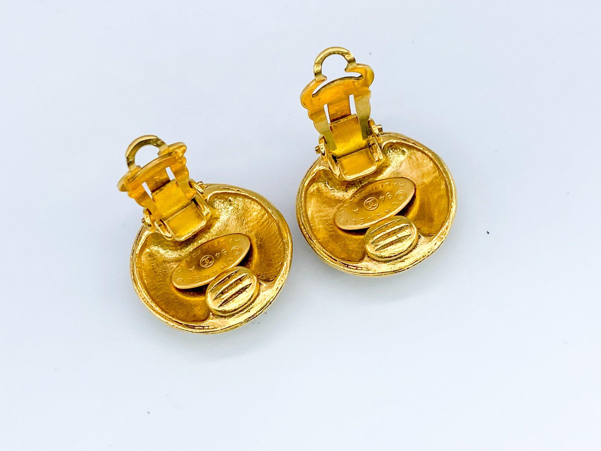 Chanel Vintage 1990s Clip on Earrings. 

Cast from gold plated metal and emblazoned with the all important chanel CC logo. Made for the 1994 Autumn Winter Collection. 

The 90s was an iconic era for Chanel with Victoire de Castellane at the