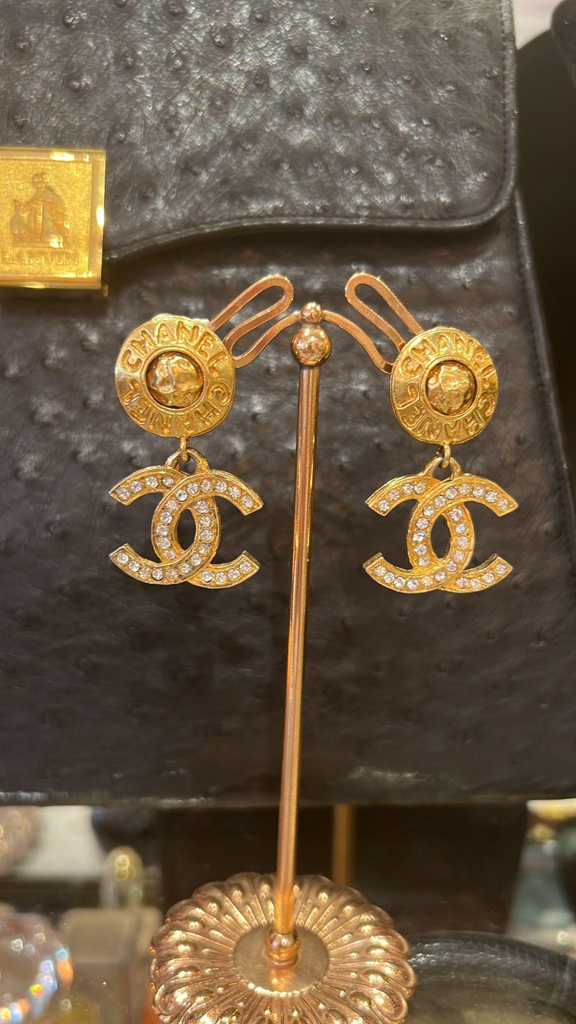 Chanel Coco Mark Logo Gold Plated Vintage Clip On Earrings Vintage from 80s France. 
Magnificent Clip On Vintage Chanel gold plated  earrings  decorated with Rhinestones. These earrings belongs to highly collectible and rare pieces of vintage