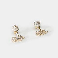 Chanel Earrings with gold metal and white pearl