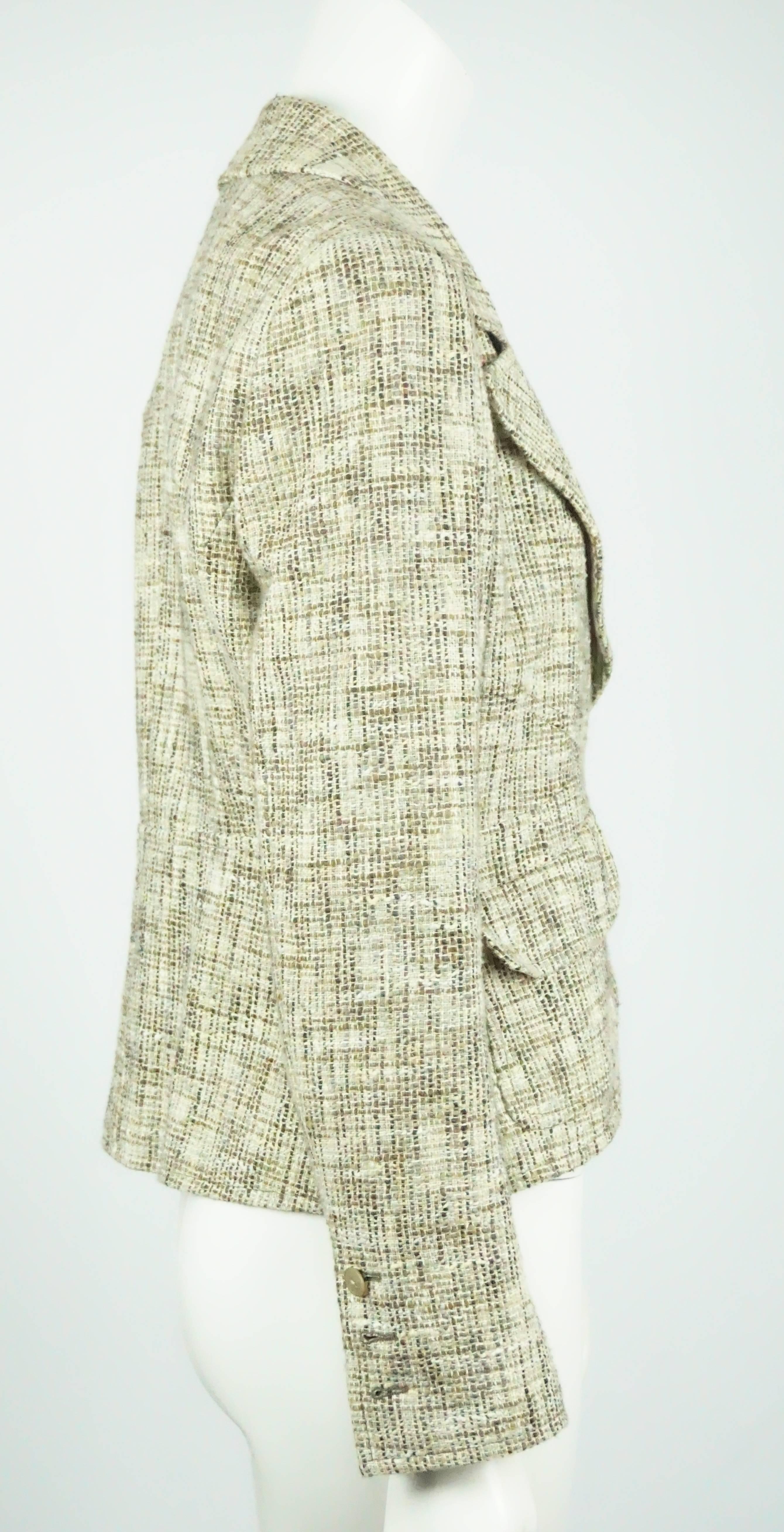 Chanel Earthtone Cotton Tweed Jacket - 42 - 03P   This very classic Chanel jacket is made of multi earthtone cotton tweed fabric, it is single breasted with one front button, 2 front pockets, 3 buttons on each sleeve, silk lined and a semi/slight