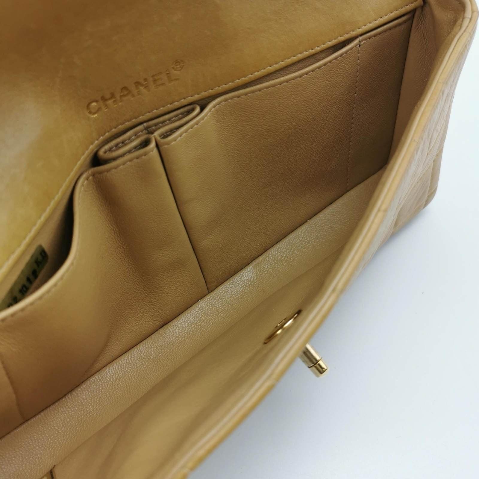 Chanel East West Chocolate Bar Beige Leather In Good Condition In AUBERVILLIERS, FR