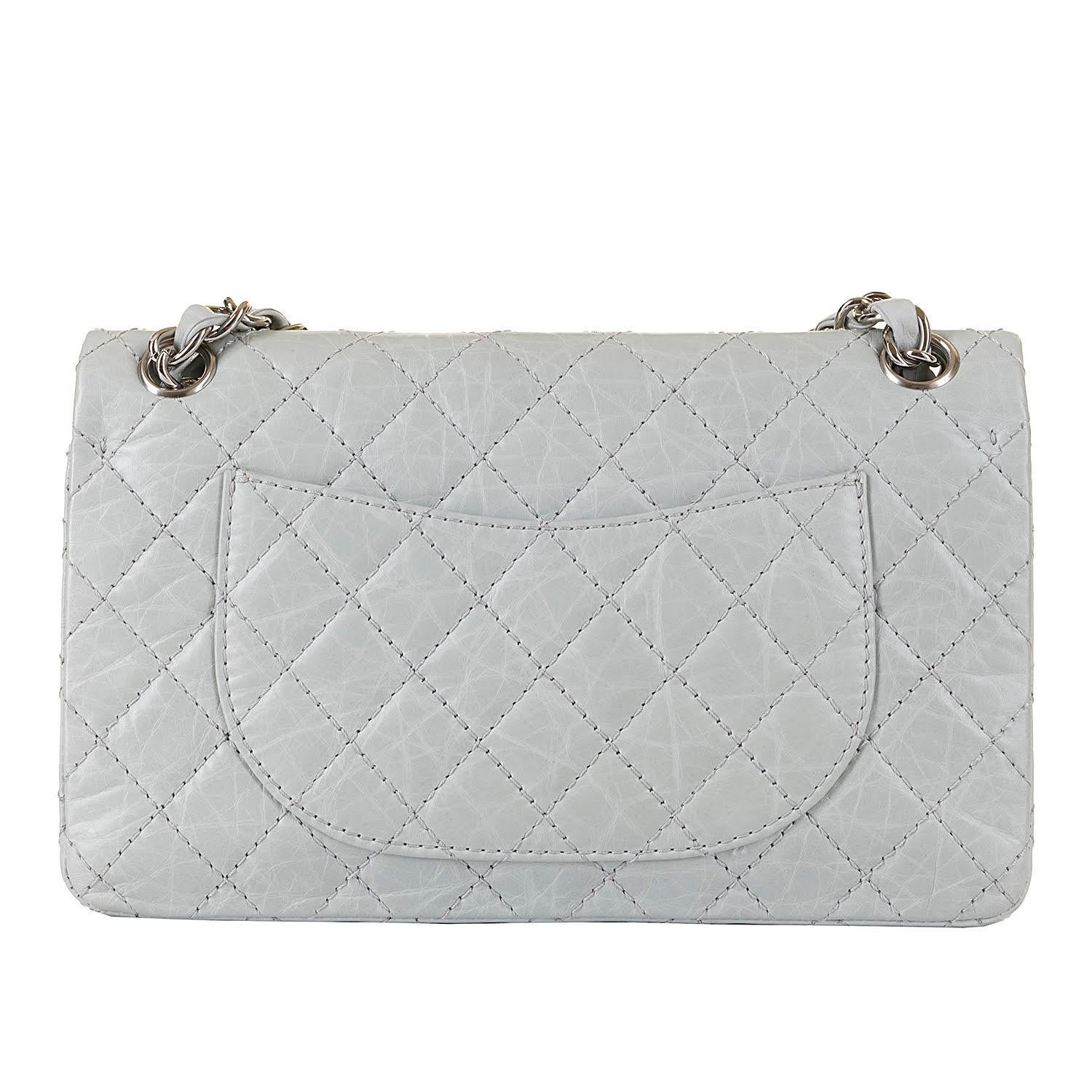 Gorgeous colour, Pristine condition, this very chic Chanel medium, double-flap, Sac Timeless Bag, is finished in 'Eau-de-Nil' quilted leather, accented with silver hardware, and is in pristine, 'New & Unused' condition, throughout. A rare colour
