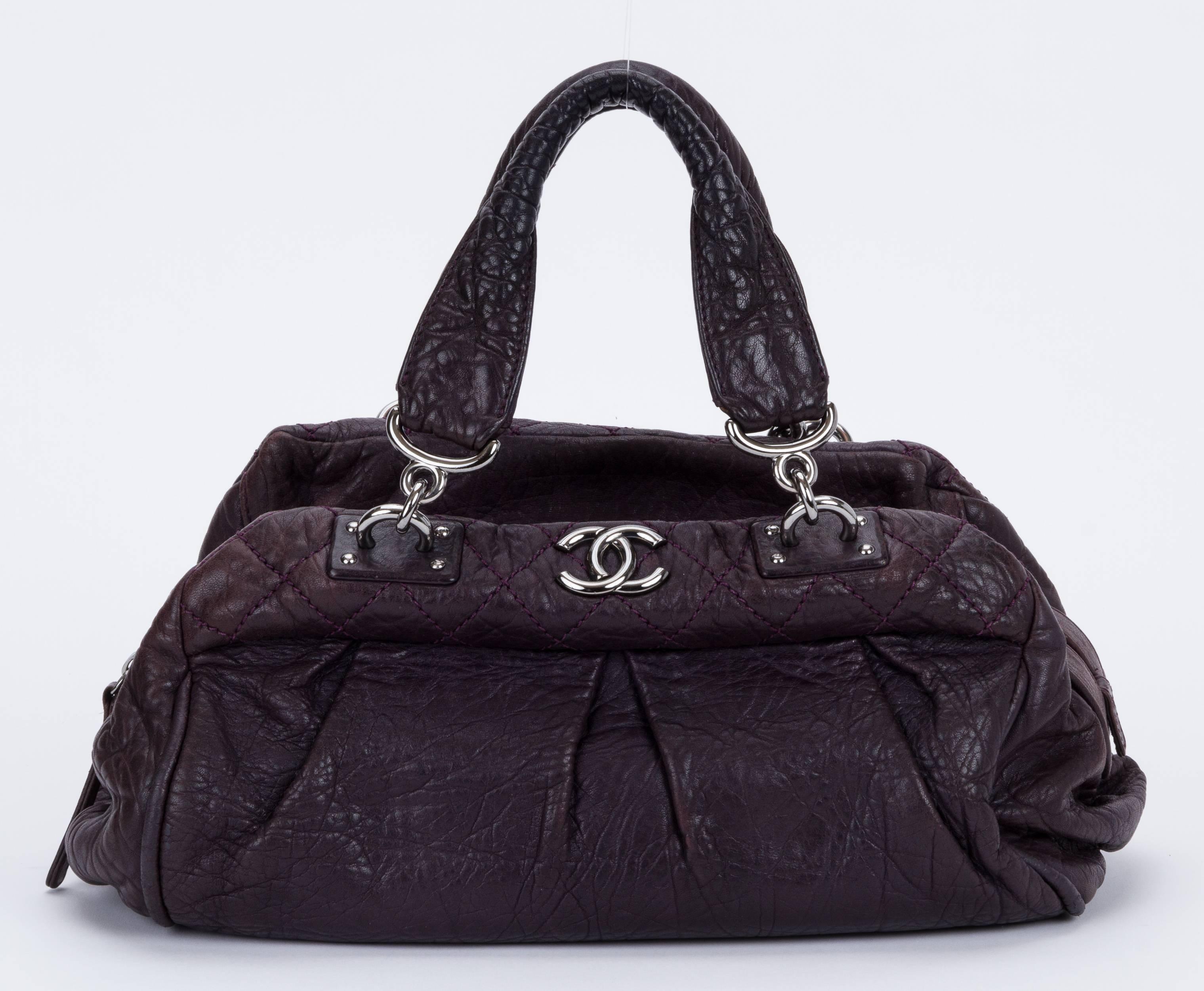 Chanel eggplant distressed leather handbag lined in platinum leather. Handle drop 5.5