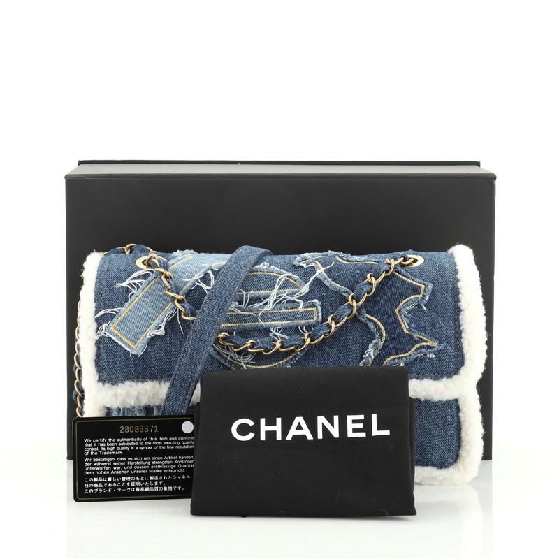 
This Chanel Egyptian Hieroglyph Flap Bag Denim and Shearling Medium, crafted from blue denim and shearling, features woven-in denim chain strap, exterior back pocket, Egyptian Hieroglyph detailing and gold-tone hardware. Its CC turn-lock closure