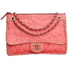 Chanel elegant bag in salmon pink leather with camellia pattern