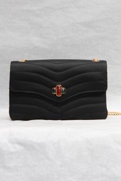 Chanel elegant evening jewel bag in black satin