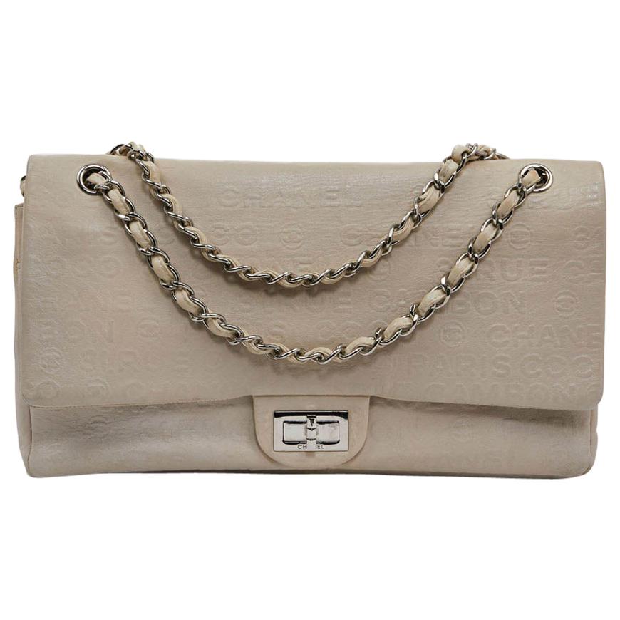 CHANEL Embossed Beige Leather Bag For Sale