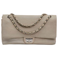CHANEL Embossed Beige Leather Bag