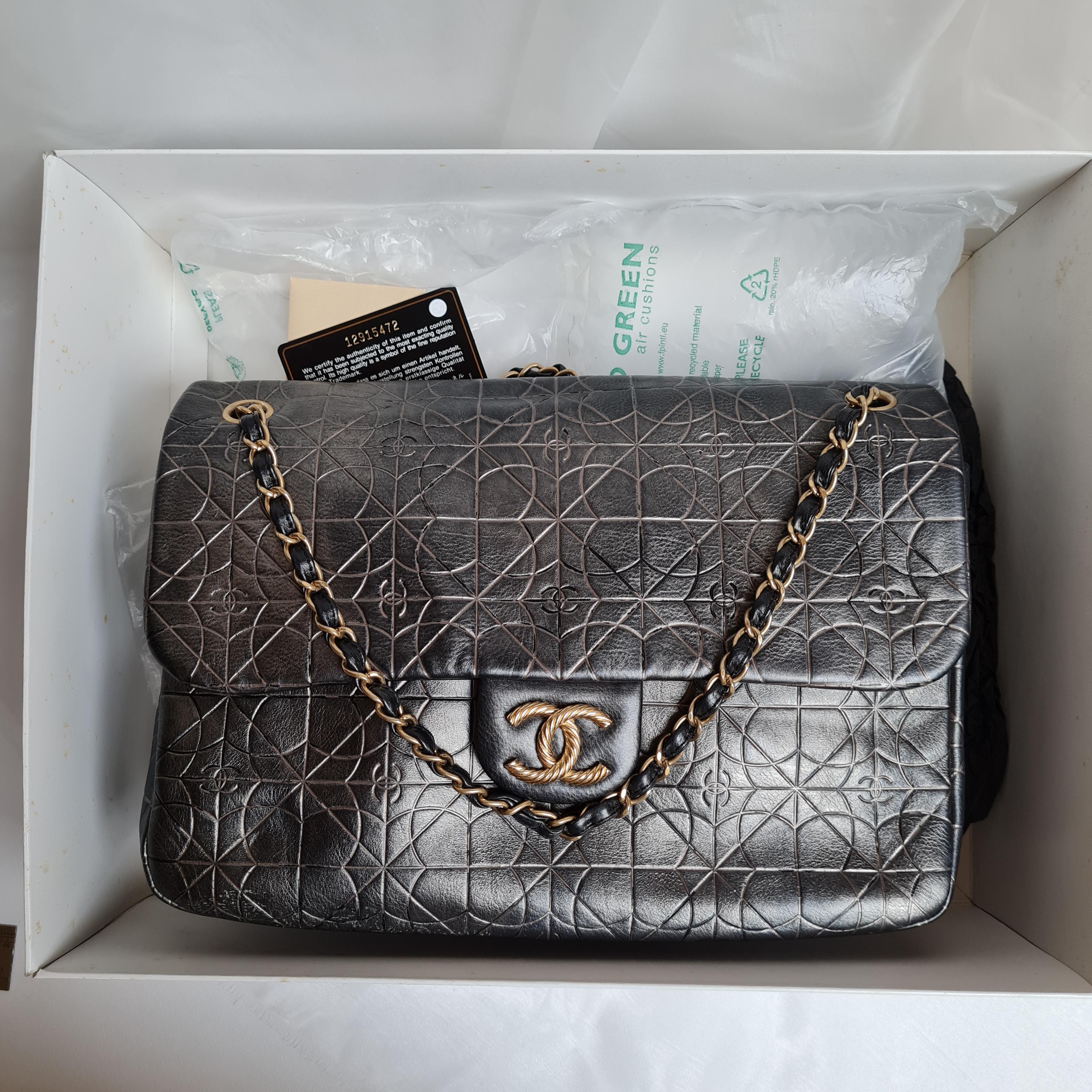 Black Chanel Embossed Jumbo Flap Bag