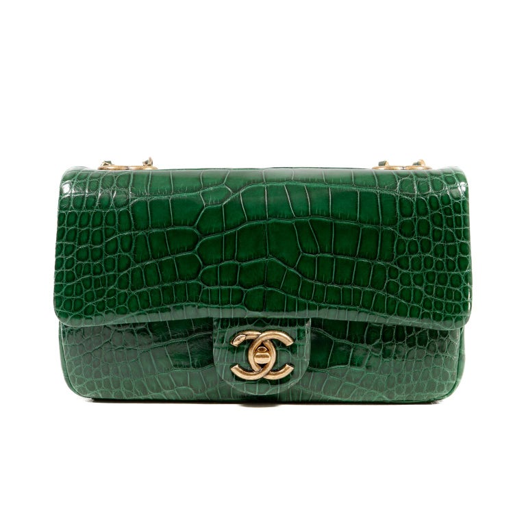 A SHINY GREEN ALLIGATOR MEDIUM DOUBLE FLAP BAG WITH GOLD HARDWARE