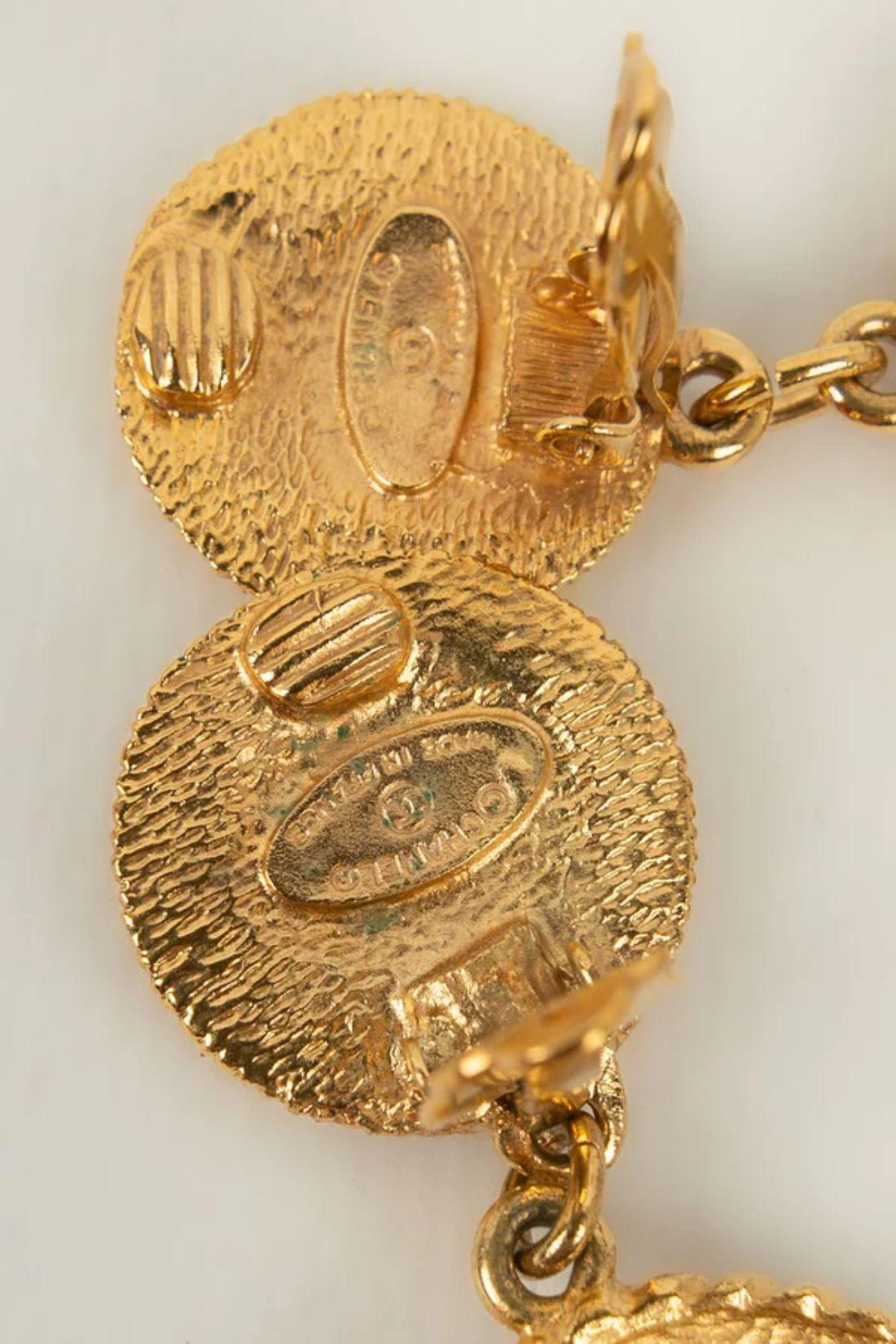 Women's Chanel Engraved Golden Metal Earrings For Sale