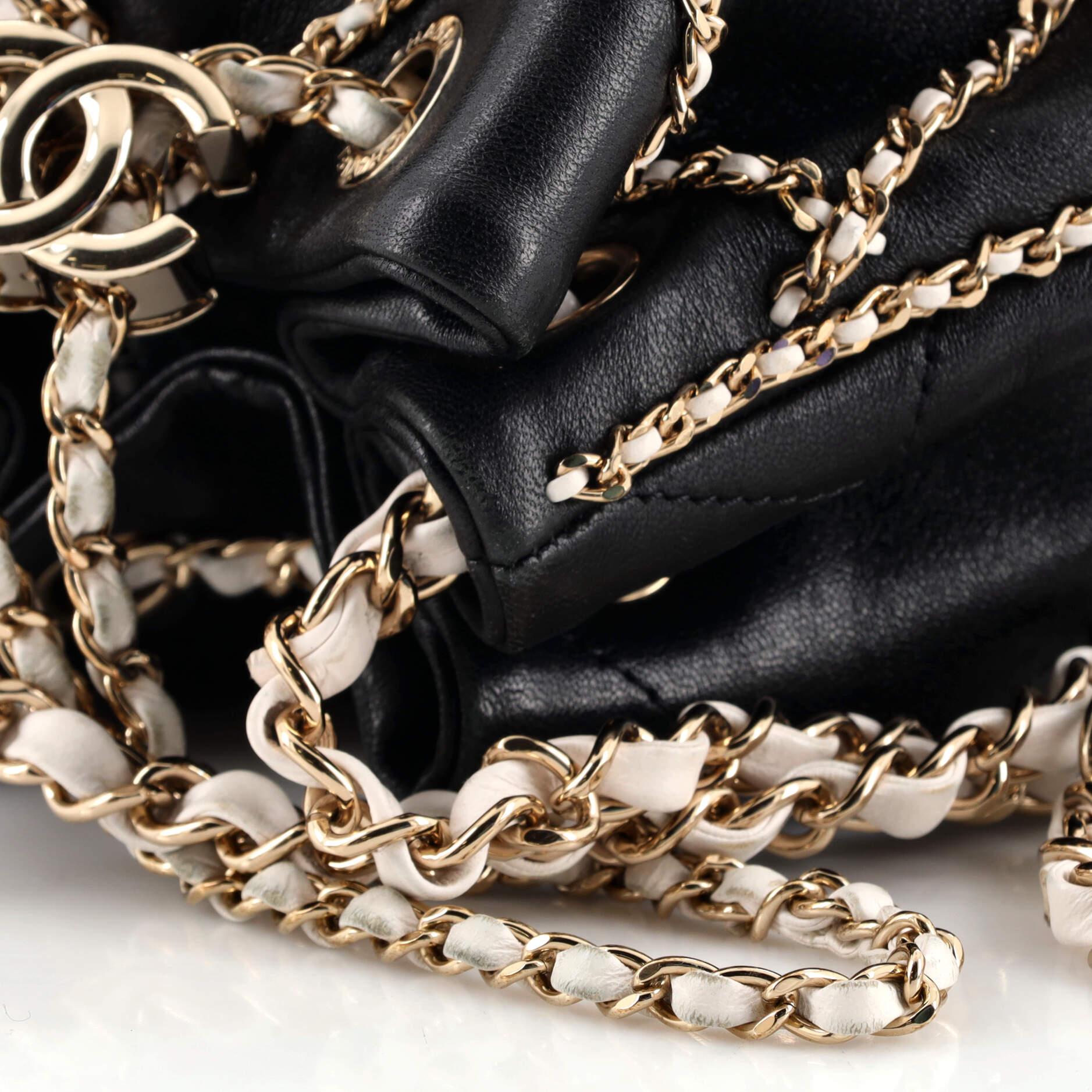 Women's or Men's Chanel Entwined Chain Drawstring Bucket Bag Quilted Lambskin Mini