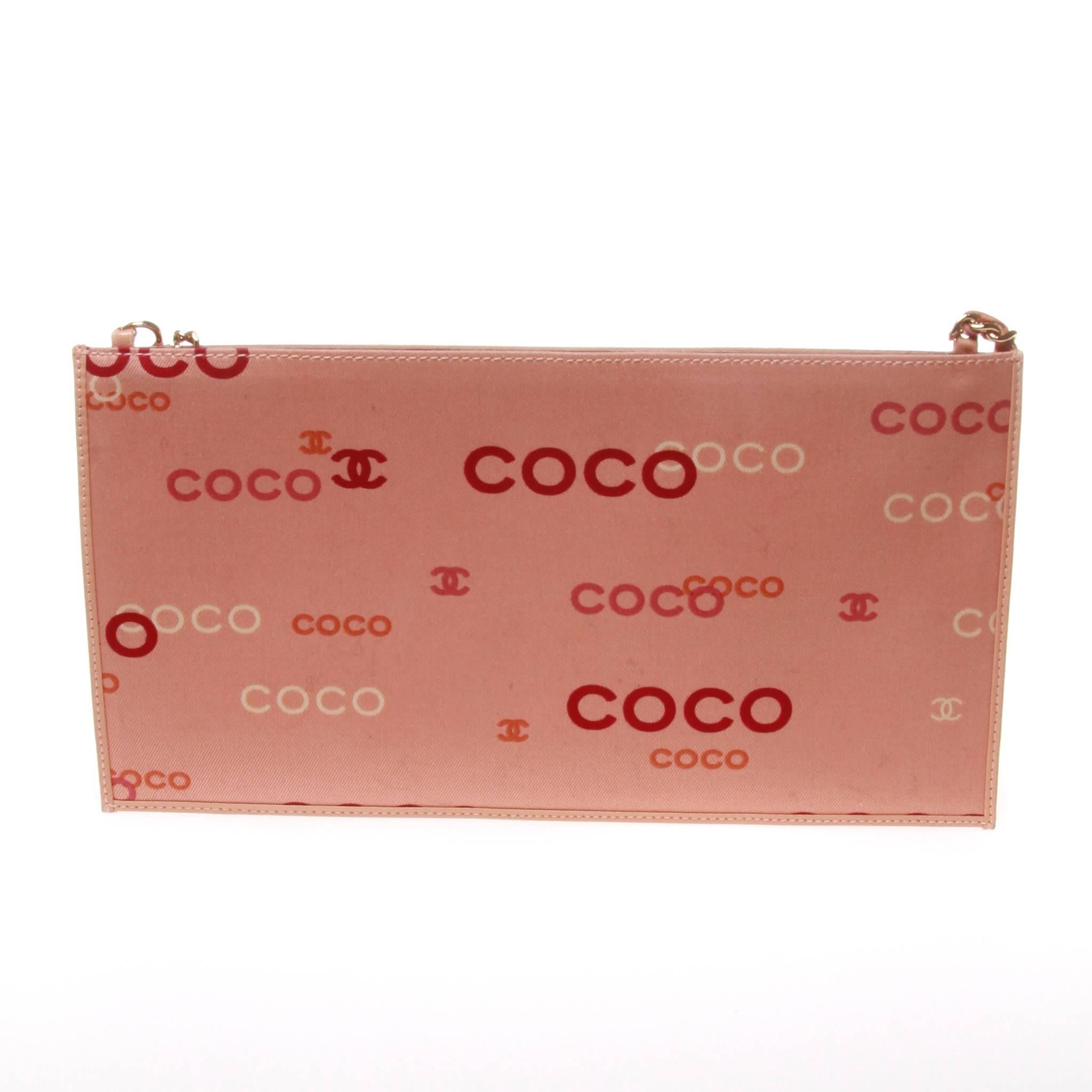 Orange Chanel envelope pouch with coco graphic