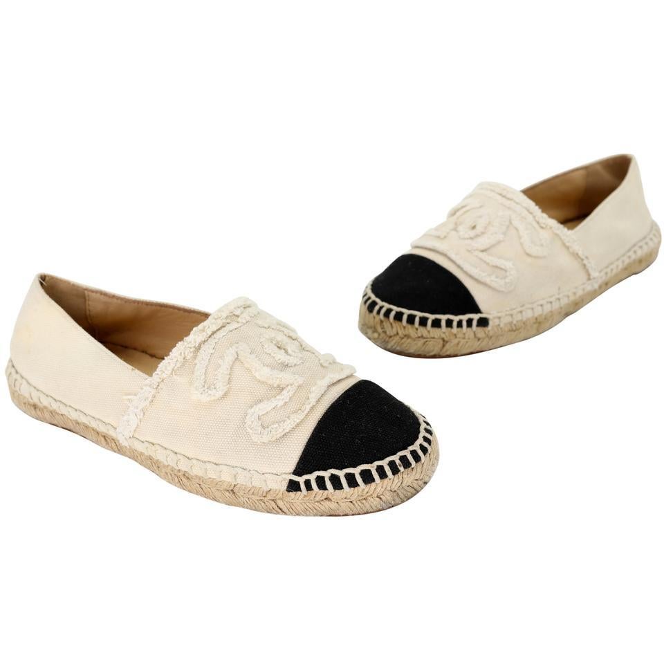 These youthful and fun Chanel elegant off white style Espadrille Flats can enhance any style. These highly sought after espadrilles from 14P are a must have for any trendy fashionista! These flats include the signature woven rope Espadrille style