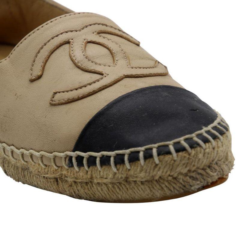 Chanel Espadrille 37 Lambskin Monogram Ballerina CC Flats CC-0228N-0055

These fun Chanel Beige/Black Leather Cap Toe Espadrille Flats can enhance any style. These highly sought after espadrilles are a must have for any trendy fashionista! These