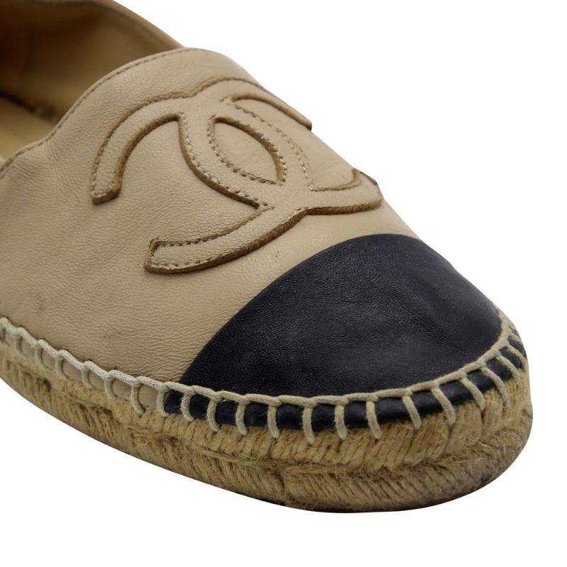 Chanel Espadrilles 37 Leather Cap Toe CC Embroidered Flats CC-0228N-0054

These fun Chanel Beige/Black Leather Cap Toe Espadrille Flats can enhance any style. These highly sought after espadrilles are a must have for any trendy fashionista! These