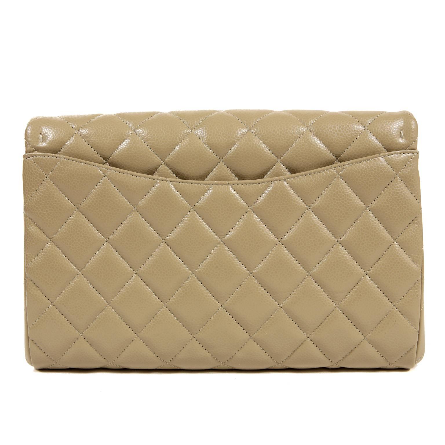 Chanel Etoupe Caviar Clutch Shoulder Bag- PRISTINE; appears never before carried.  
Splendidly versatile, the neutral color, medium size, and optional strap make this Chanel clutch a smart addition to any wardrobe. 
Sophisticated etoupe caviar