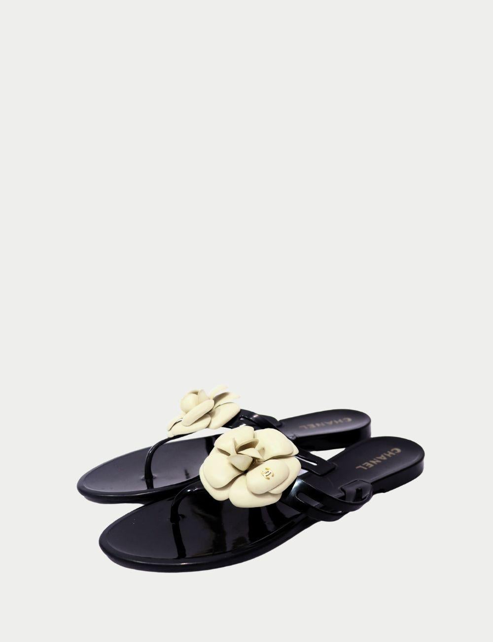 Chanel Black Camellia Flower Jelly Sandals

Add a playful yet elegant touch to your summer wardrobe with these Chanel black jelly sandals, adorned with the house’s iconic camellia flower. Crafted from glossy black rubber, these sandals balance