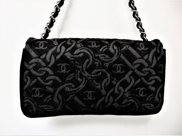 Chanel evening bag made of black jacquard fabric, woven Chanel chain and  logo!