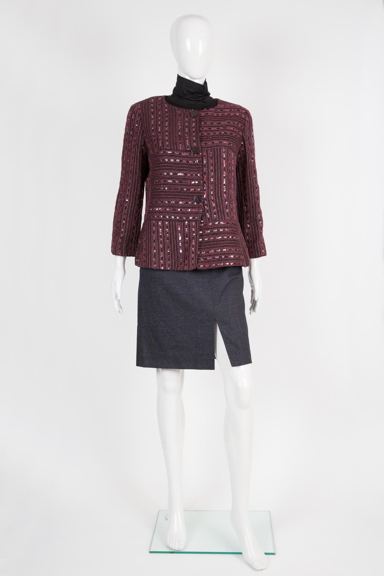 Croisiere 2000s Chanel bordeaux evening sequences tweed jacket featuring a collarless design, a sequin embellishment, a front logo button fastening, cropped long sleeves, a logo silk lining. 
Circa 2000s. 
Label size 42fr/US10/UK14
In excellent