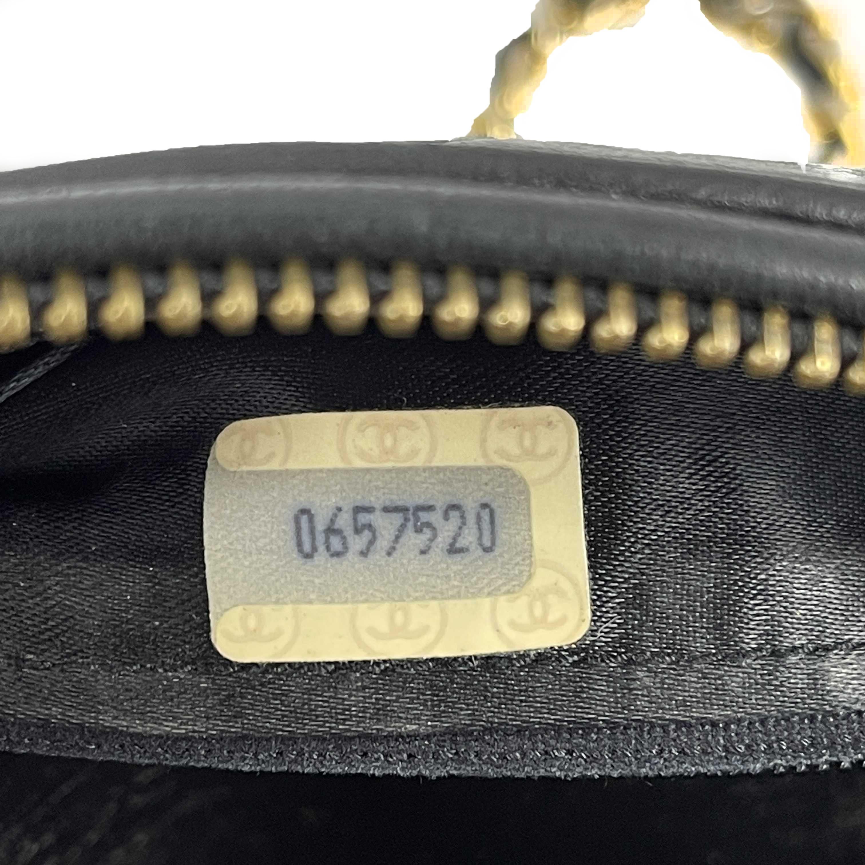 CHANEL Excellent Vintage 1980's Black Mini Quilted CC Tassel Barrel Crossbody In Excellent Condition In Sanford, FL