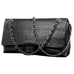 Chanel Extra Large Maxi Classic Double Flap 224657 Black Embossed Leather Should