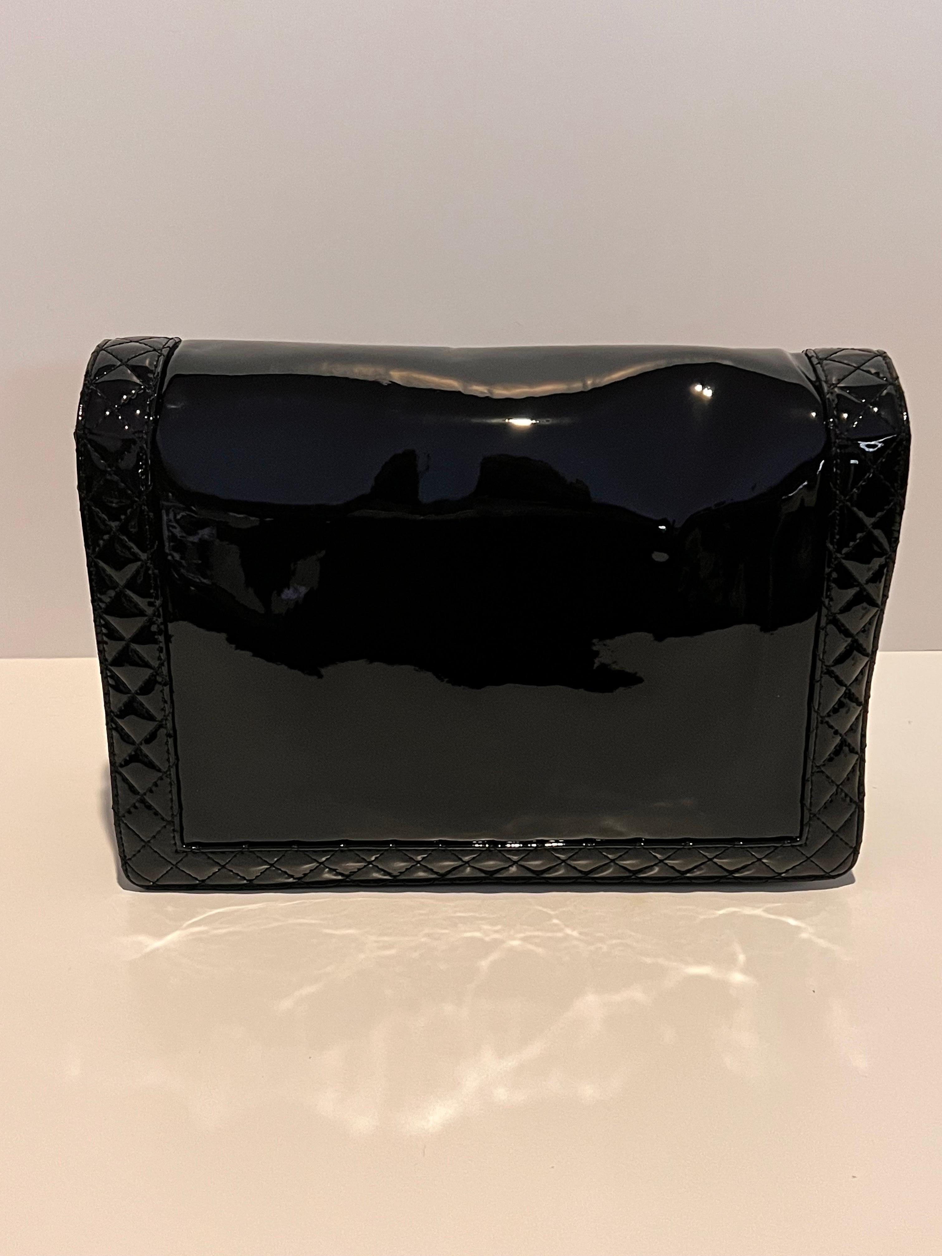 Chanel Extra Large Patent Boy Bag never used, new in the box! Mint condition. 

This stunning Chanel Boy bag is inspired by Coco Chanel's first lover. Crafted from patent leather and features silver hardware. Finished with the signature double C