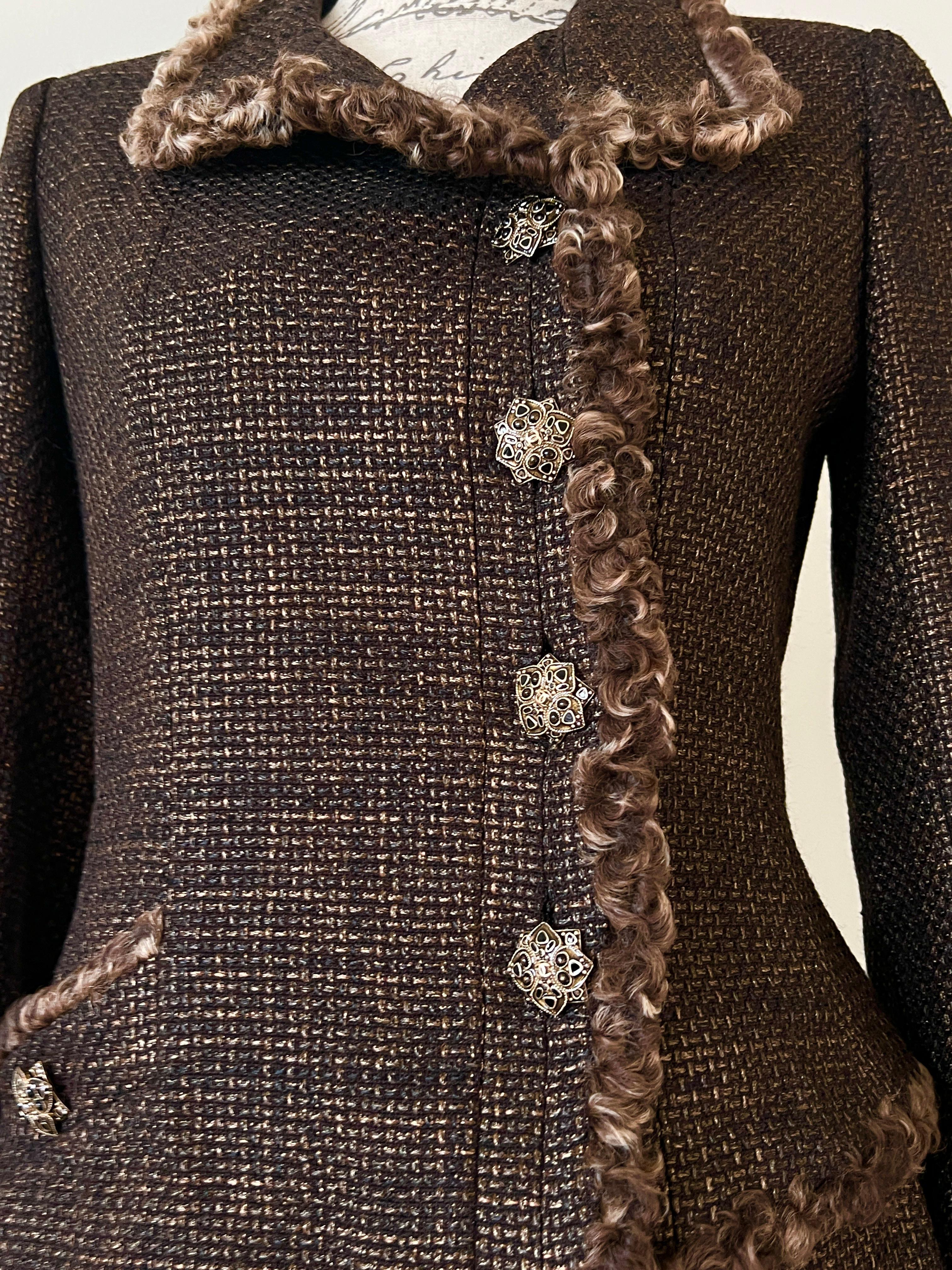 Extremely rare Chanel chocolate brown tweed suit - jacket and skirt- from 2009 Pre-Fall Metiers d'Art Collection by Mr Karl Lagerfeld
- stunning CC logo jewel Gripoix buttons
- precious lesage tweed with intricate bronze shimmer
- CC logo charm at
