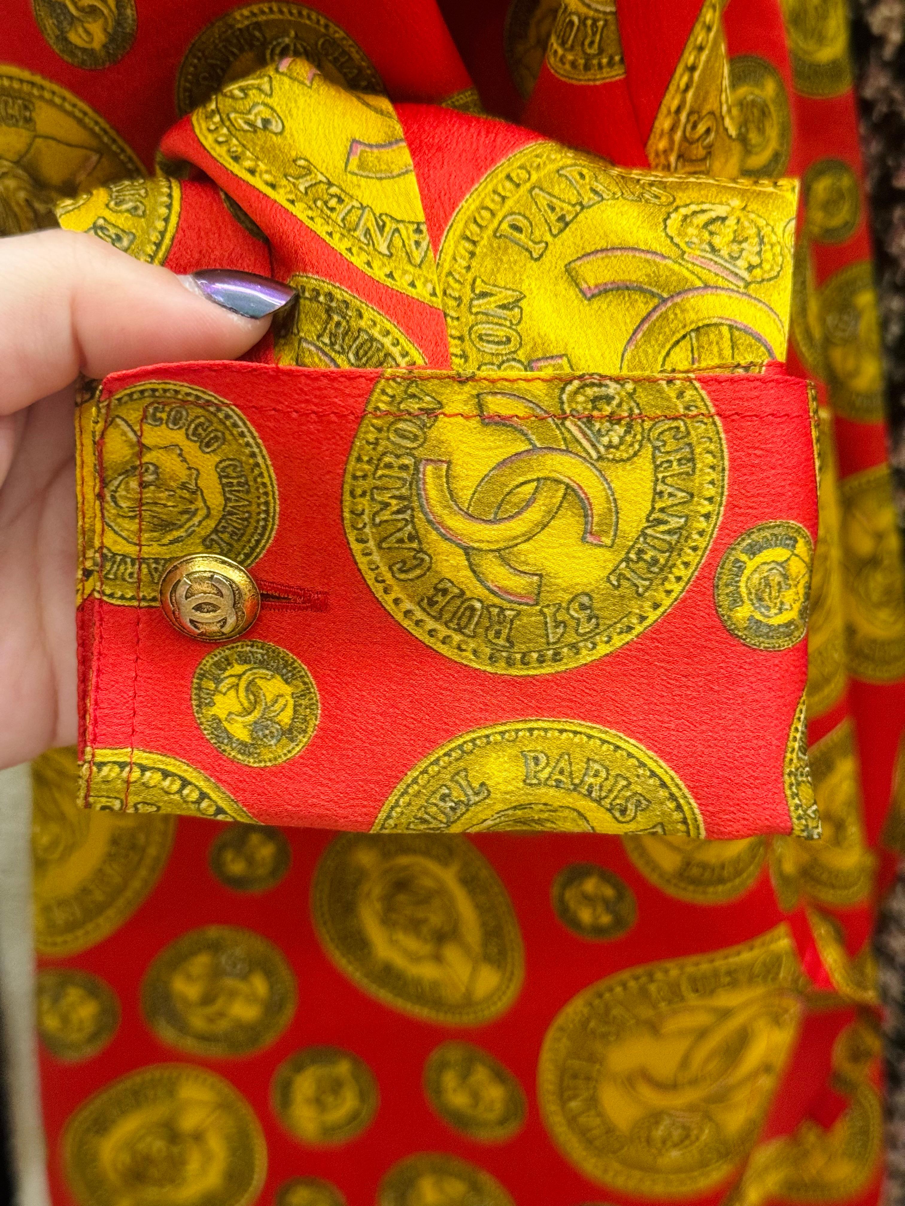 Rare Chanel Fall Winter 1985 Runway coin print red and gold silk shirt, mao collar, CC logo cuff links, size 36 FR but it fits up to US 4-6. Excellent condition 