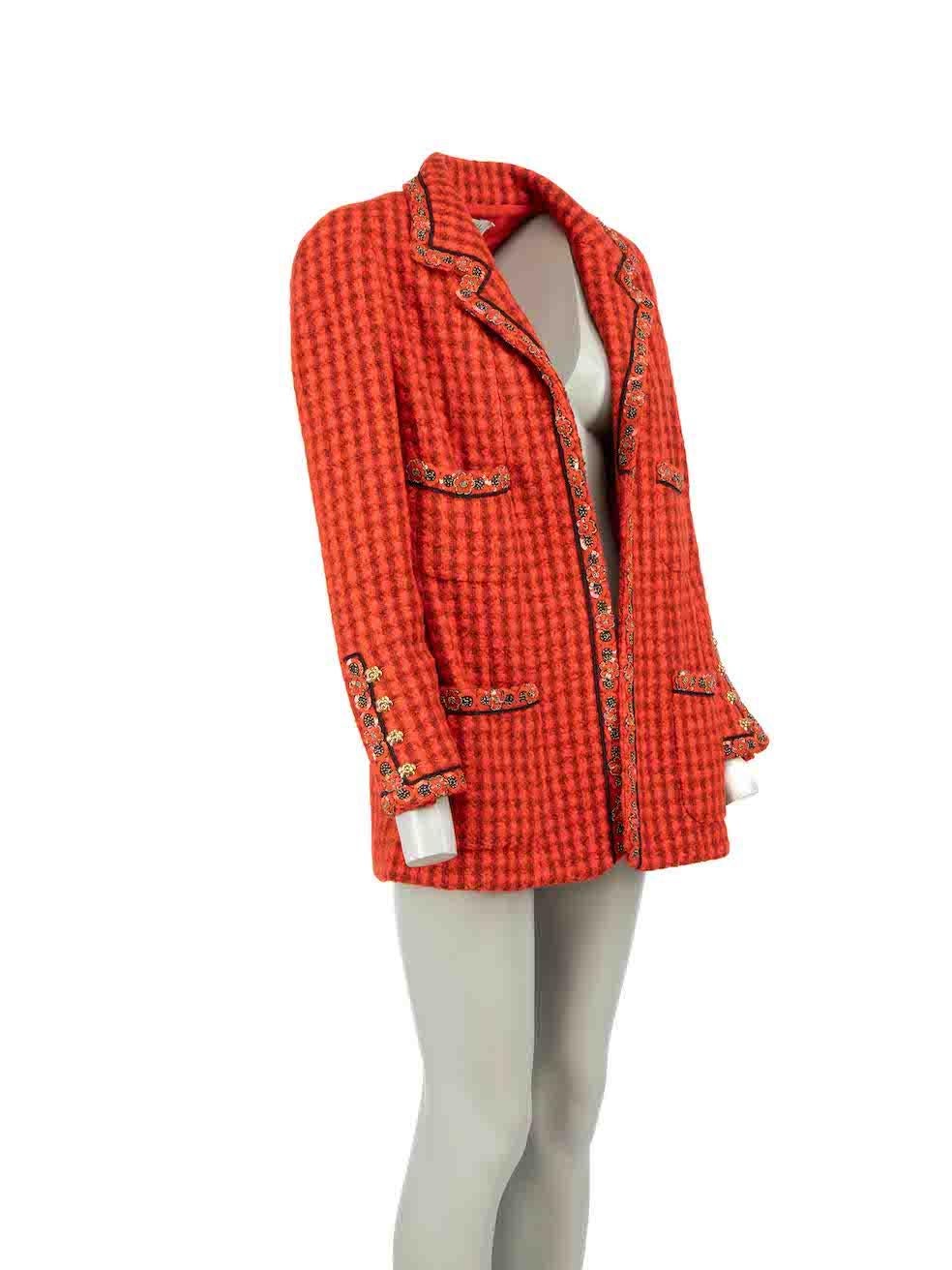 CONDITION is Very good. Minimal wear to jacket is evident. Minimal loose stitching to embellishments and brand label is slightly loose on this used Chanel designer resale item.

Details
F/W 1990/1991
Vintage
Red
Wool
Blazer
Gingham pattern
Floral