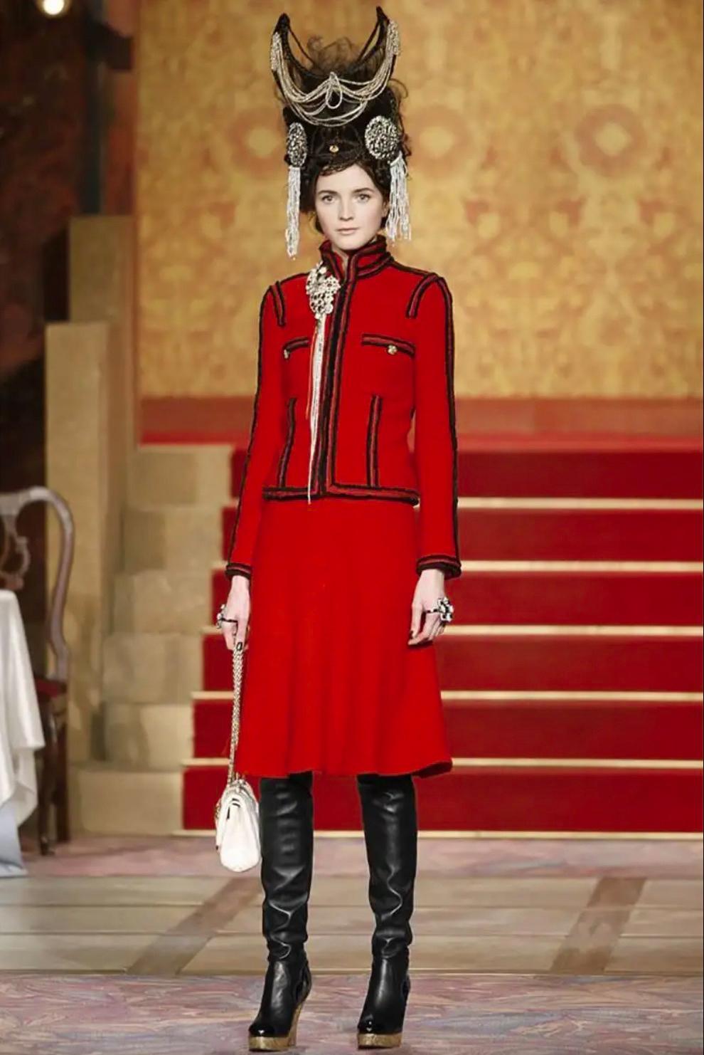 This extraordinary piece is from Chanel's 2009 Métiers d'Art Collection, designed by Karl Lagerfeld, famously known as the 