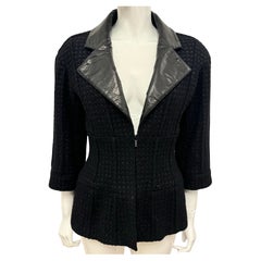 Chanel collezione Supermarket A/I 2014 giacca in tweed e pelle di vitello fantasia nera