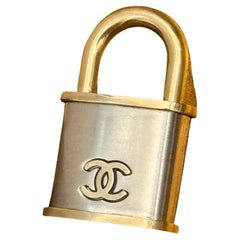 Chanel F/W 2014 supermarket collection padlock brooch worn by G Dragon Chanel F/W 2014 supermarket collection padlock brooch worn by G Dragon