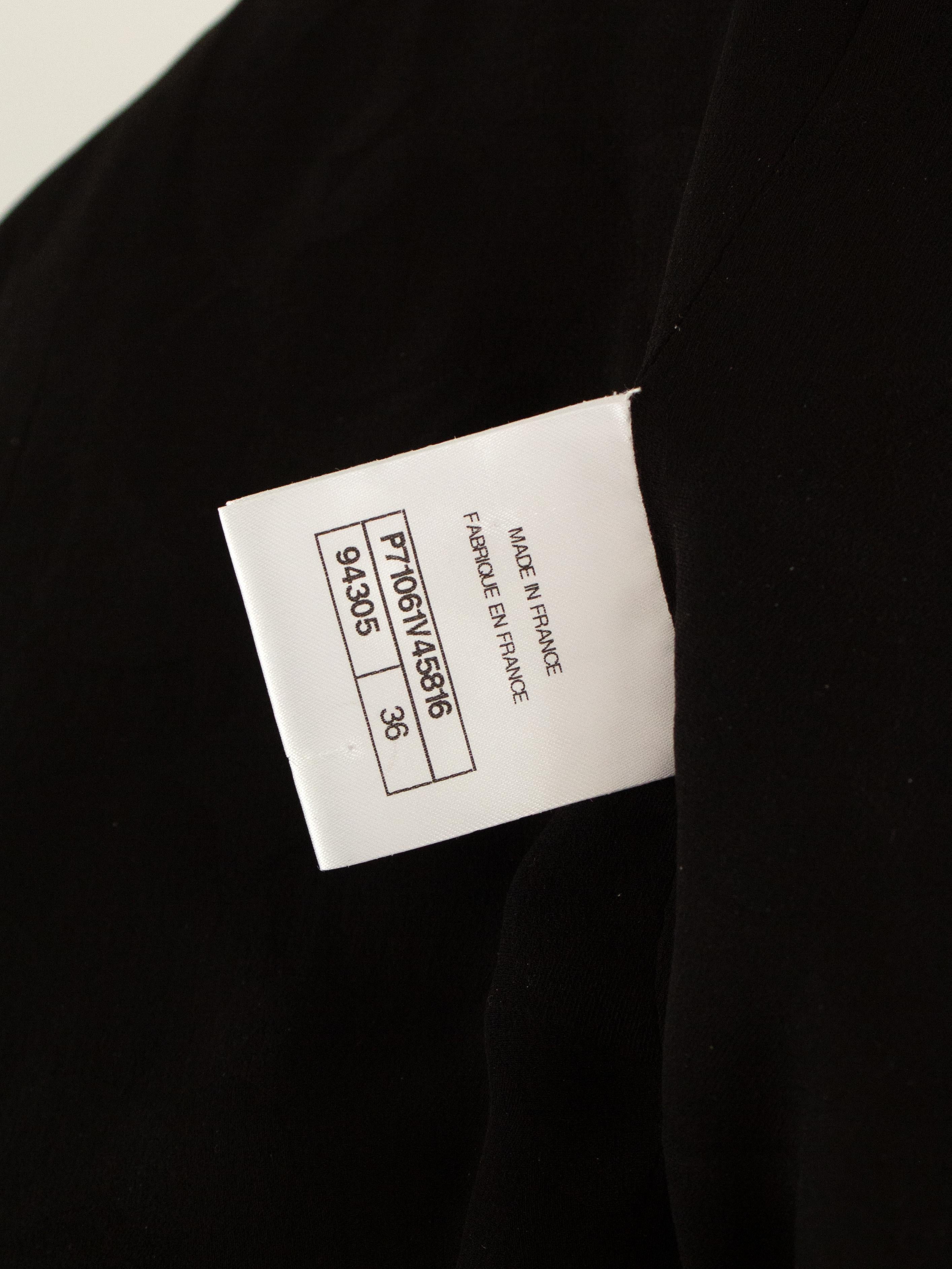 Chanel A/I 2021 Metiers D'Art Chateau Des Dames - Giacca nera senza spalle 9