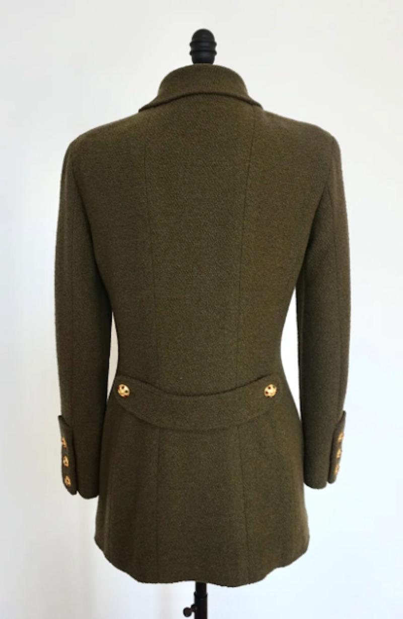 Chanel Fall 1996 Olive Green Jacket with Gripoix Buttons. This is a classic and versatile piece perfect for the Fall/ Winter season. The deep olive green contrasted with the iconic Chanel gripoix buttons is a unique aspect to this stunning piece.