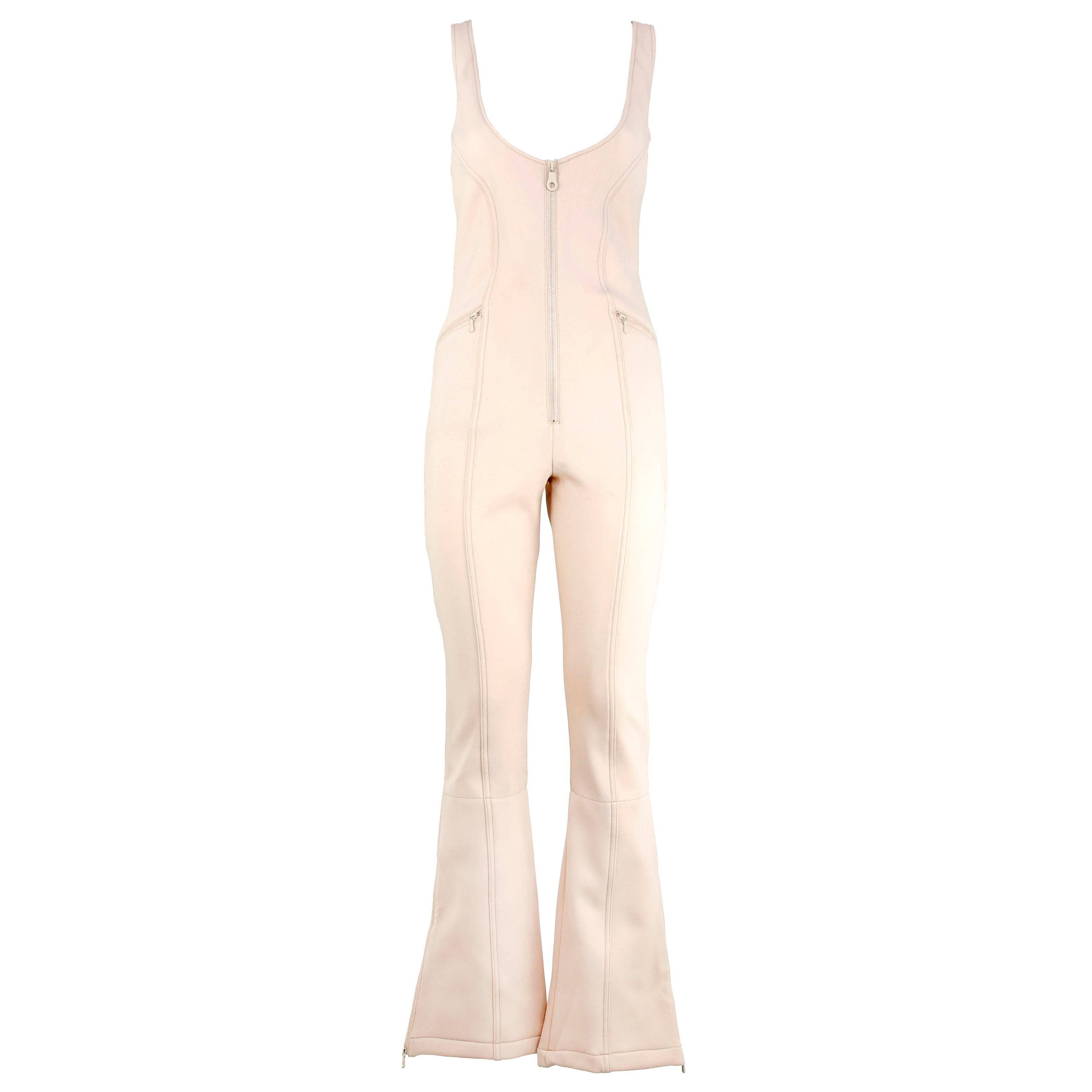 Rare Chanel Fall 2001 Ski Jumpsuit color beige. Size 36 FR.

Condition:
Unworn.