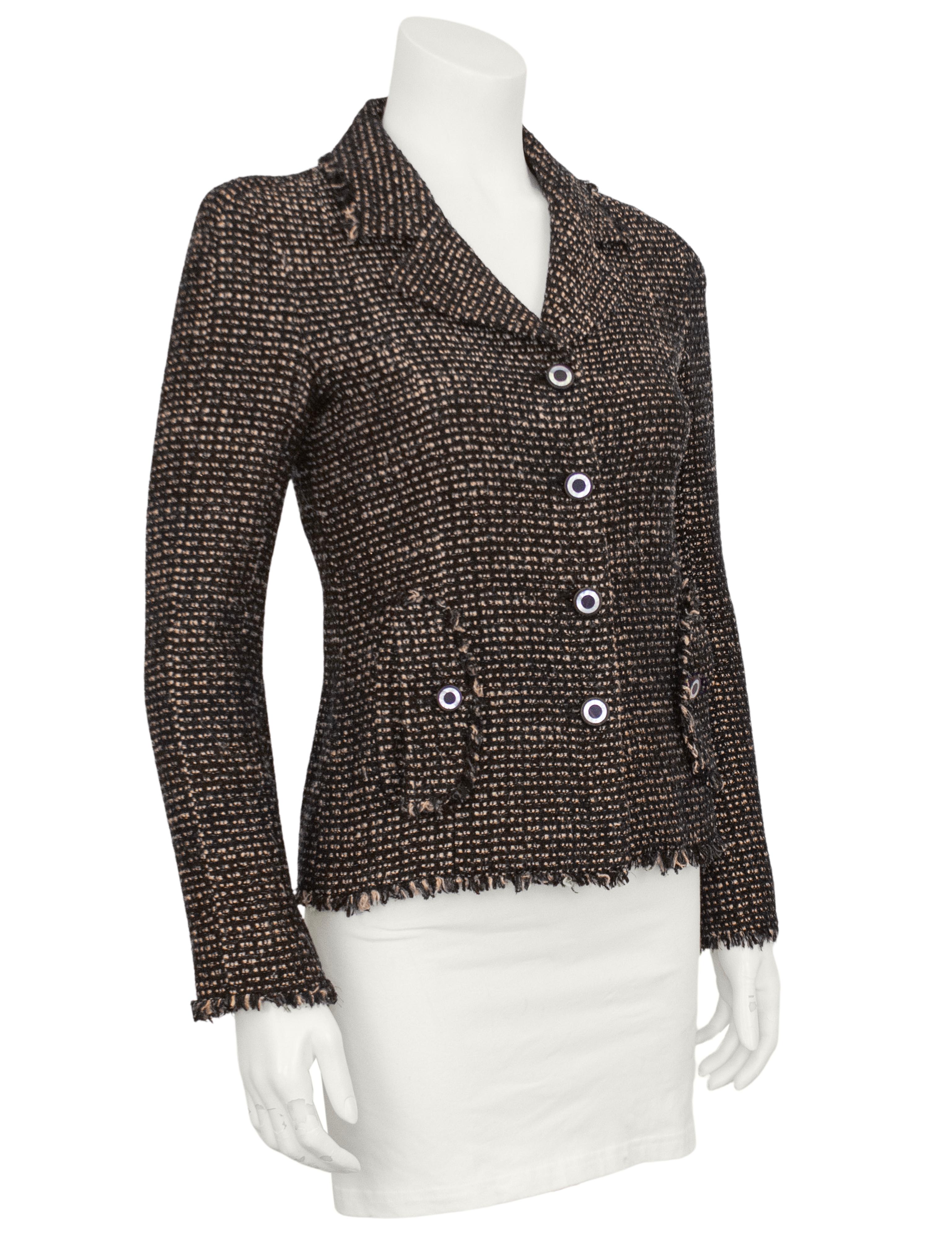 Gorgeous Chanel black and copper tweed blazer from the Fall 2003 RTW collection by Karl Lagerfeld. It features a notched lapel, wood buttons and vertical flap pockets. Fringe trim at the collar, cuffs and across the hem. Fitted through the body and