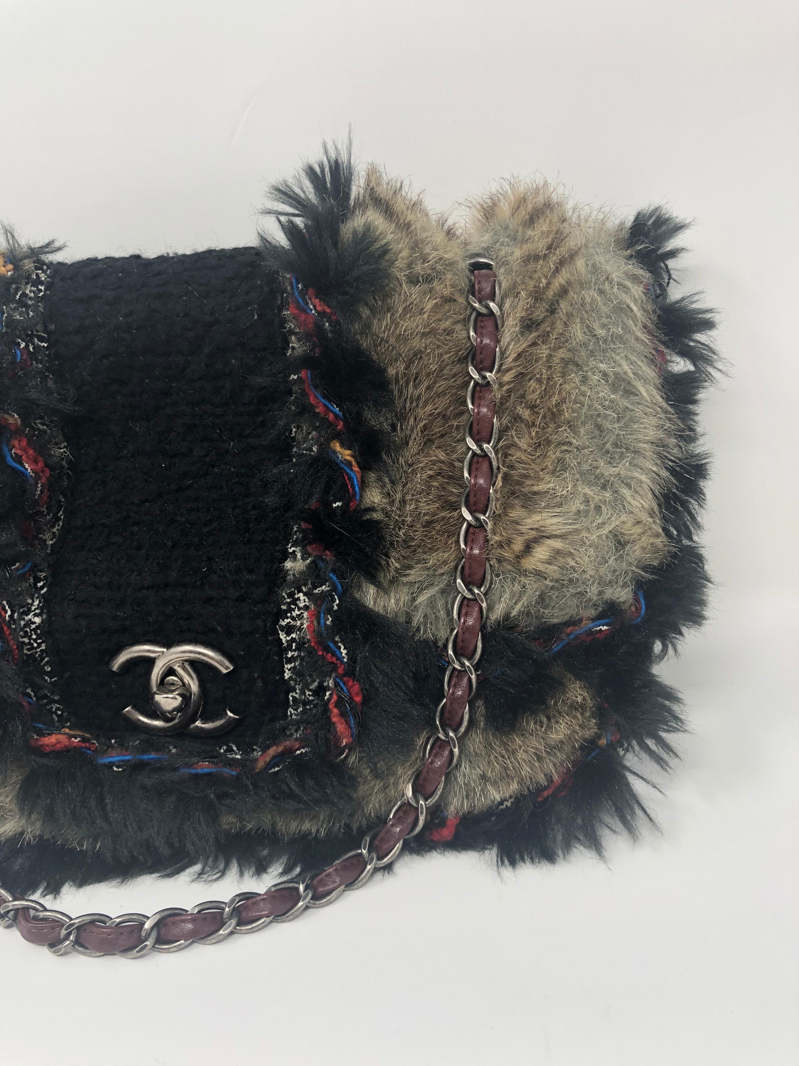 Chanel Fur Limited Bag. Faux fur and tweed with burgundy leather straps. Unique look and style from the house of Chanel. Very good condition. Collector's piece. Silver hardware with CC turn lock clasp. Own this for your collection. Guaranteed
