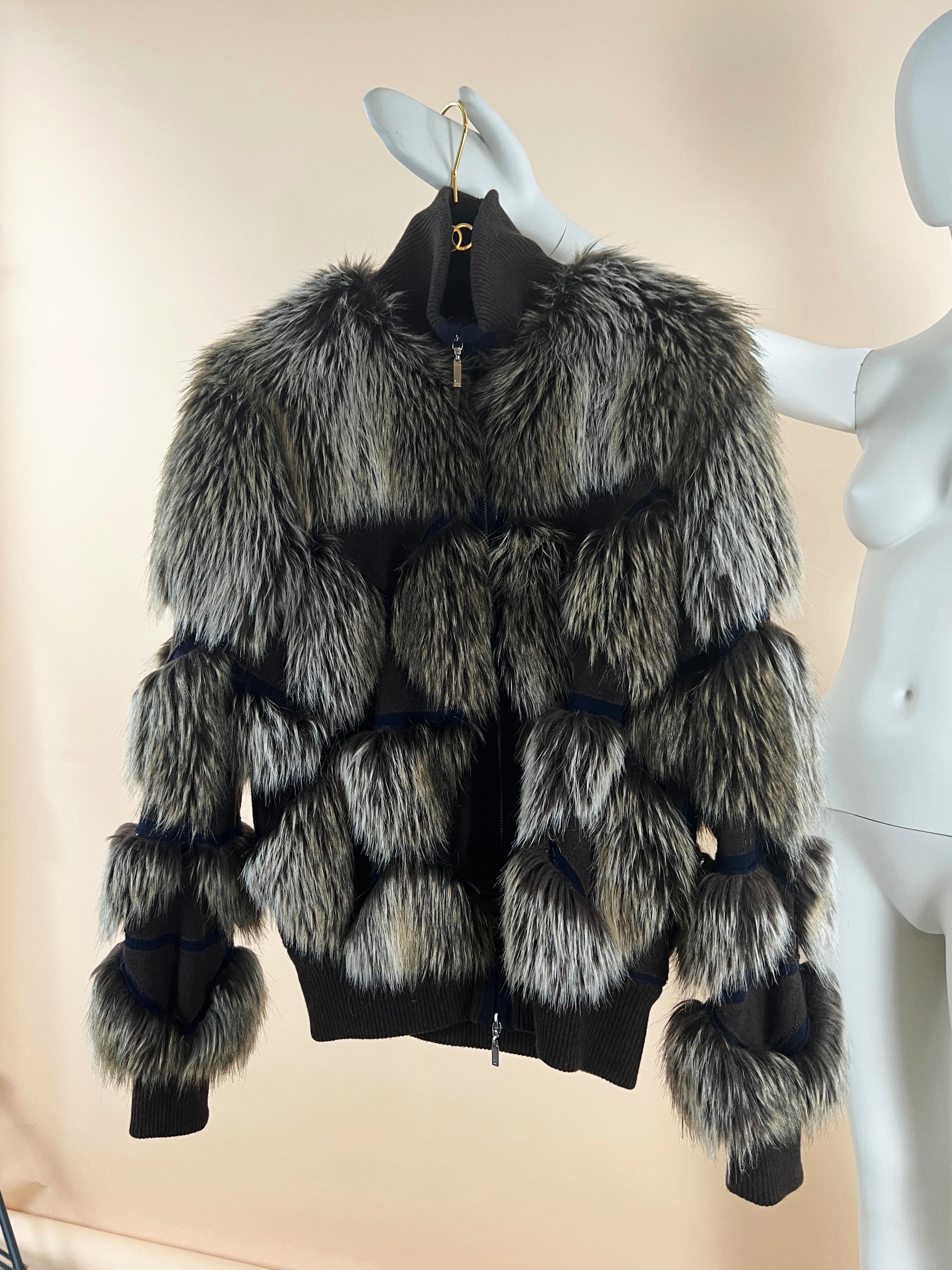 Gorgeous Chanel beige faux fantasy fur jacket with 100% cashmere thick lining. 
From ''Arctic Ice' 2010 Fall Collection. Something similar was also seen on Catwalk of 2018 Fall Collection.
CC two-way zippers at front. Very stylish oversized