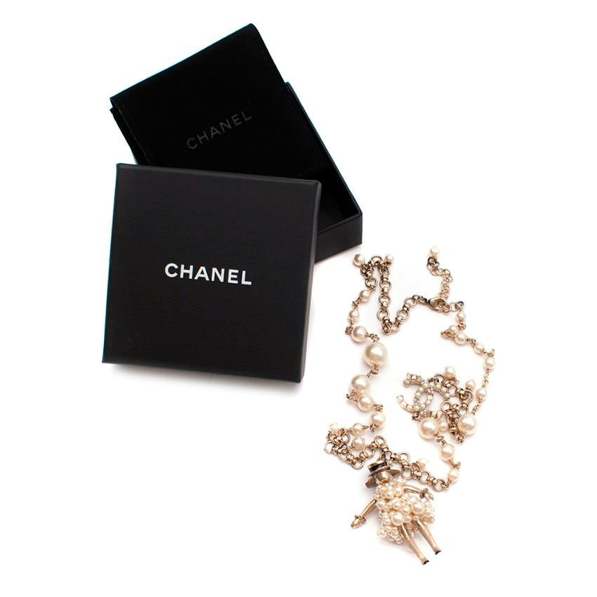 chanel doll necklace