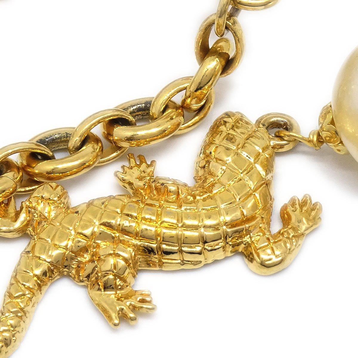 CHANEL Faux Pearl Gold Metal Reptile Charm Chain Link Waist Belt In Good Condition In Chicago, IL