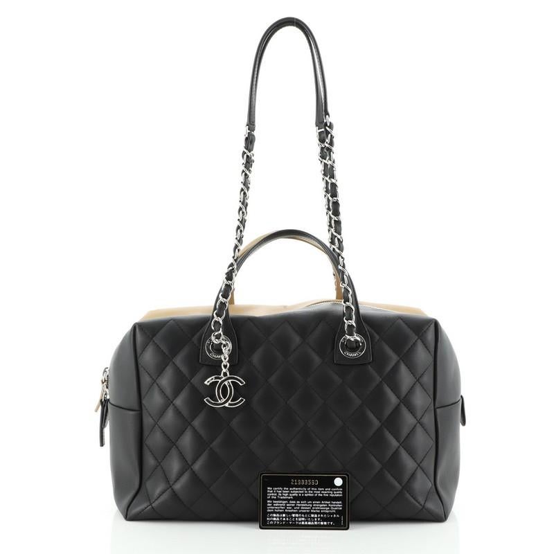 Chanel
Model: Feather Weight Bowling Bag Quilted Lambskin Medium