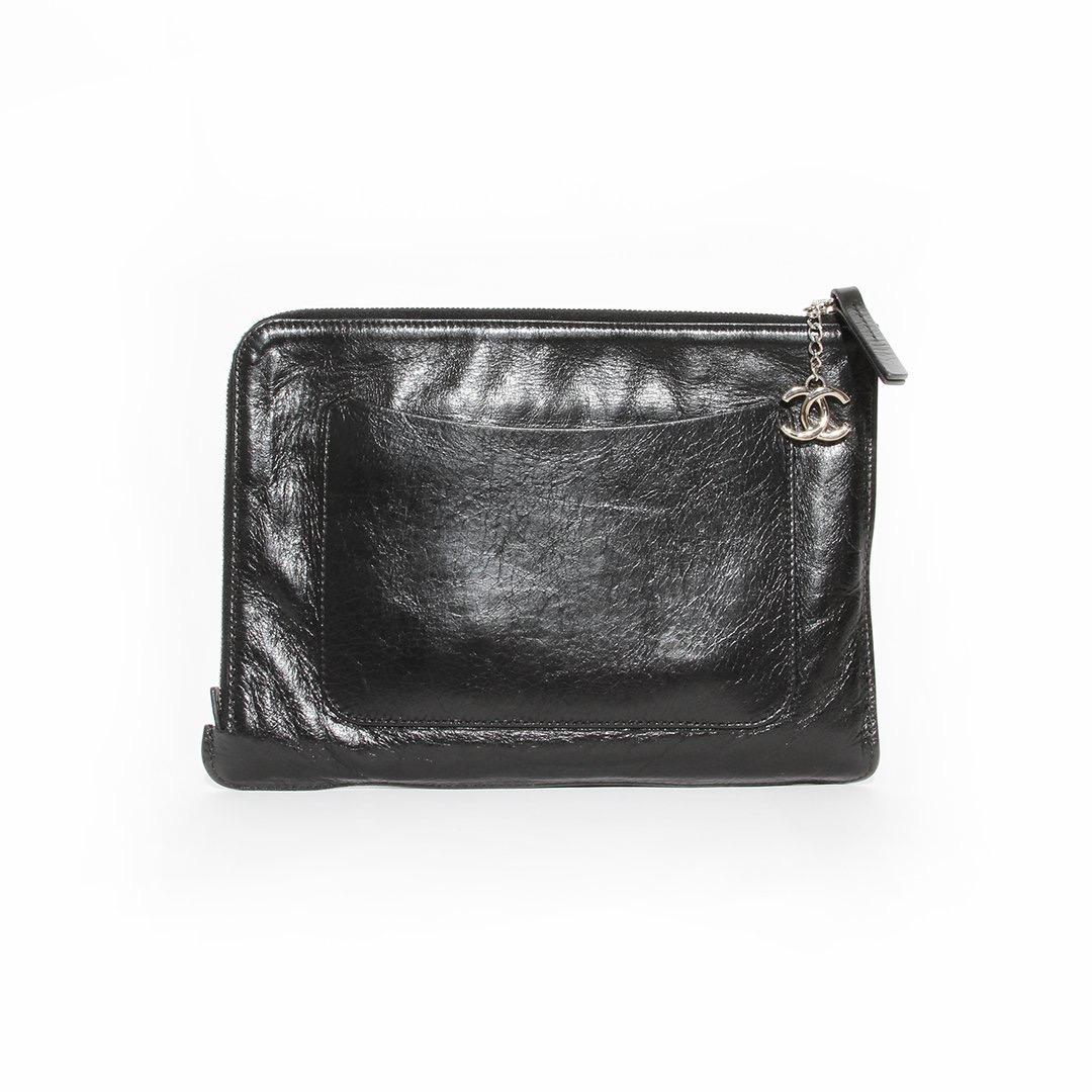 Feminist clutch by Chanel
Circa 2014-2015 
Black leather
Raised text 