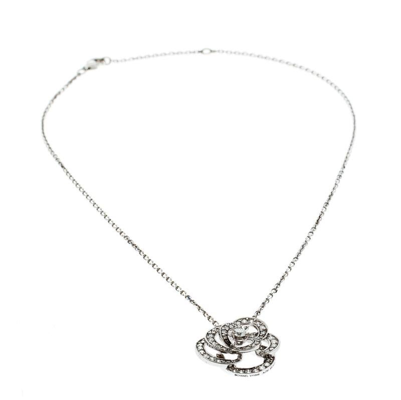 Camellia is a conspicuous signature of the house Chanel and its use can be traced back to years as far as the 1920s. This iconic flower is translated well in this gorgeous necklace. It is created from 18k white gold, and the chain holds a